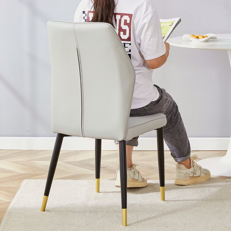 8 chaises de salle à manger modernes avec un élégant dossier à motif en polyuréthane et des pieds en métal pour une expérience confortable à la maison dans la cuisine, la chambre à coucher et le bureau.