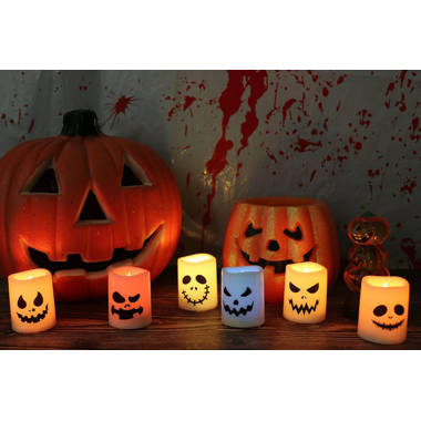 https://assets.wfcdn.com/im/31973077/resize-h380-w380%5Ecompr-r70/2567/256772359/Halloween+Flameless+Votive+Candles+Color+Changing+With+Remote+Timer%2C+Battery+Operated+LED+Tealight+Candles+For+Halloween+Home+Decoration+Gifts.jpg
