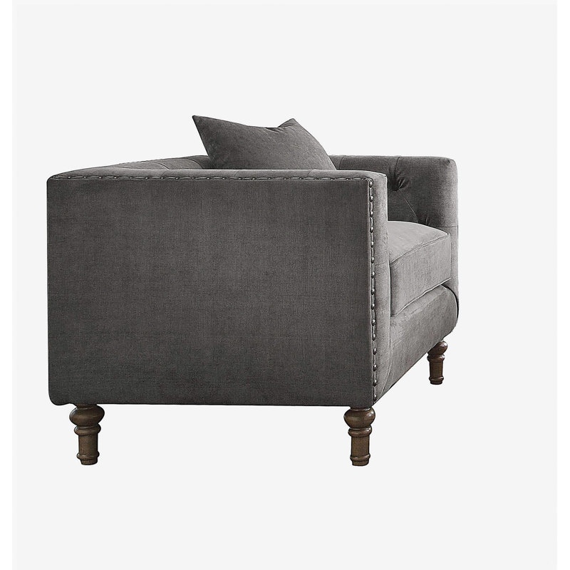 Chaise d'appoint grise avec coussin