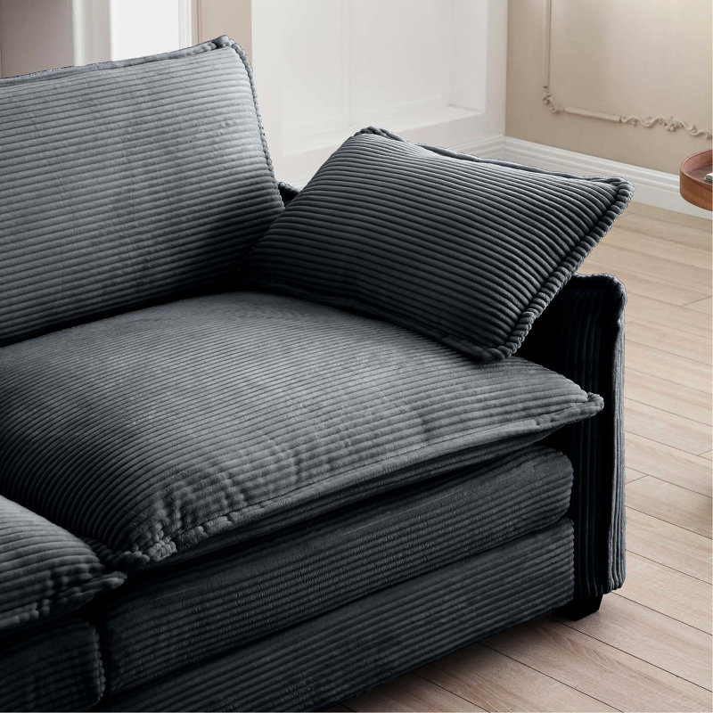 Velours côtelé gris, s'harmonisant avec différents canapés, créant une atmosphère relaxante idéale pour offrir une sensation luxueuse avec un tissu doux