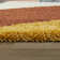 Tapis géométrique orange / gris / brun Satterlee