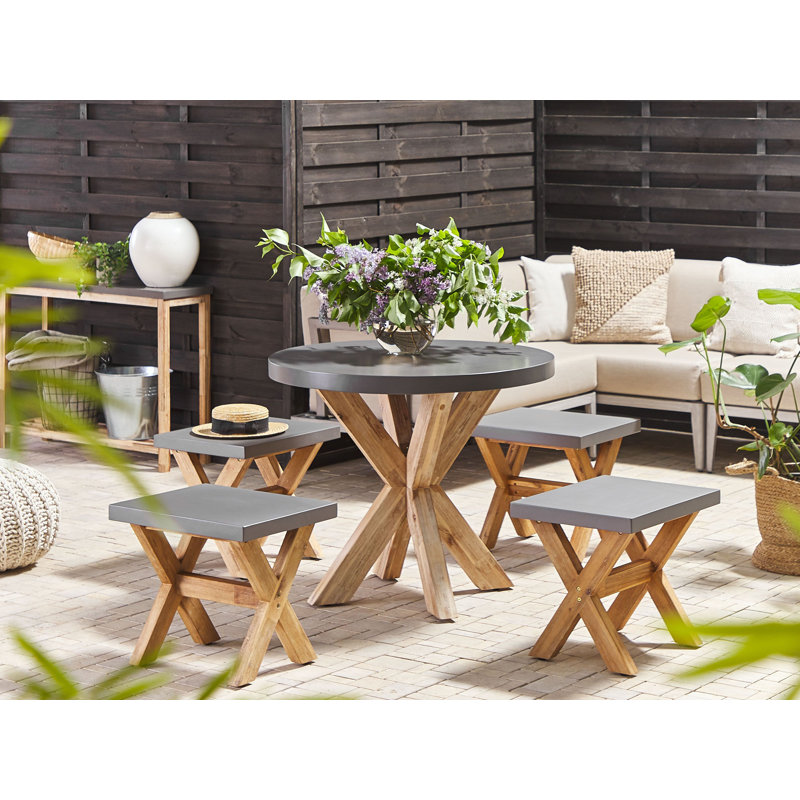 Valladares 4 - Person Patio Dining Set Round Table with Cushions Included