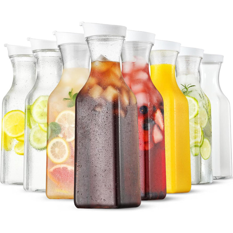 Carafe à eau en plastique avec couvercle à couvercle rabattable carafe à jus de fruits en plastique transparent