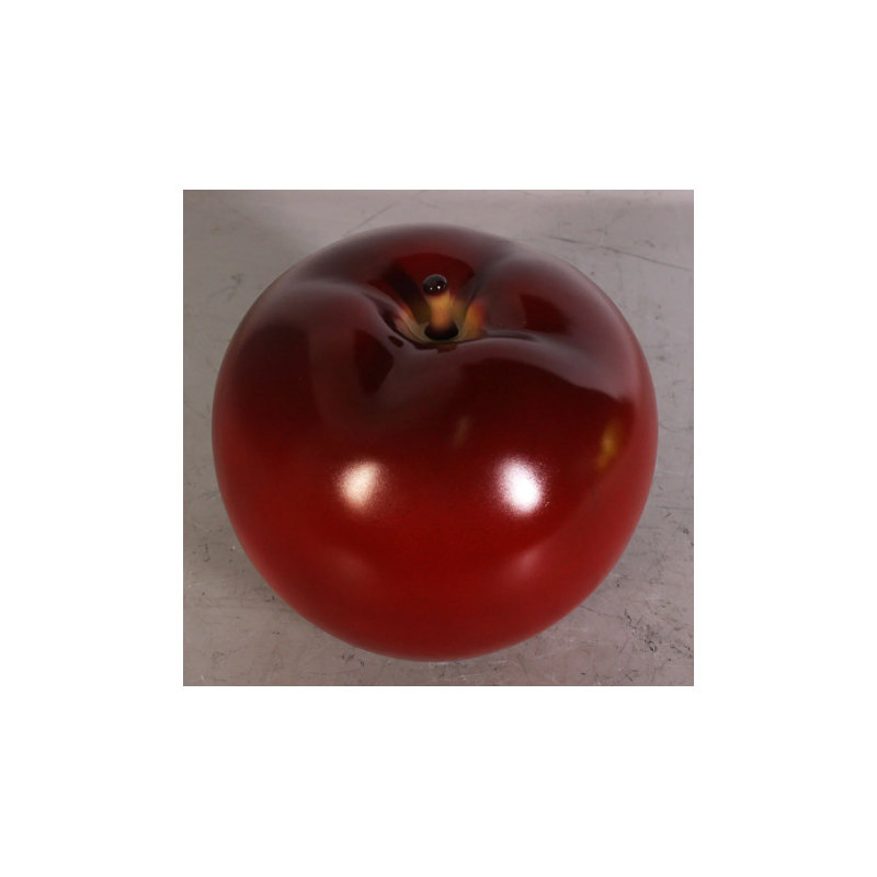 Petite statue de pomme rouge surdimensionnée