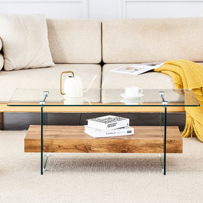 Table basse, 43,3 pouces moderne, verre transparent et autocollant en bois, options de rangement abondantes, table moderne avec pieds transparents stables à deux niveaux, verre trempé, texture polyvalente