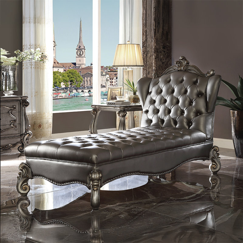Chaise longue capitonnée en similicuir