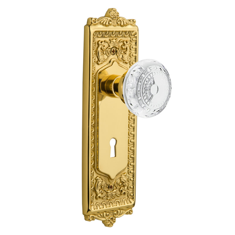 Egg & Dart Plate with Decorative Keyhole and Crystal Meadows Knob, Polished Brass, 2-3/4”