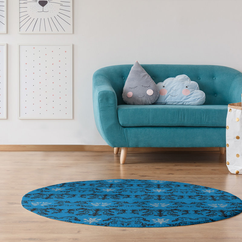 Tapis rond bleu damassé à motif baroque