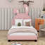 Lit plateforme tapissier en cuir avec ornement en forme de lapin-902145612-902145610