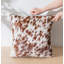 Coussin en peau de vache sel et poivre-113697318