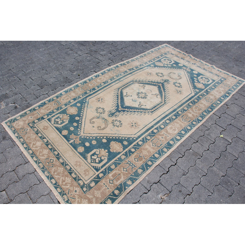 Tapis turc classique tissé à la main dans des couleurs chaudes - idéal pour les esthétiques vintage