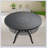 Ø47.24-inch Cast Aluminum Patio Dining Table With Black Frame and Carved Texture on the Tabletop 