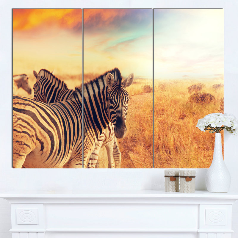 Sunset Zebras Herd Canvas Print in 36" x 28"