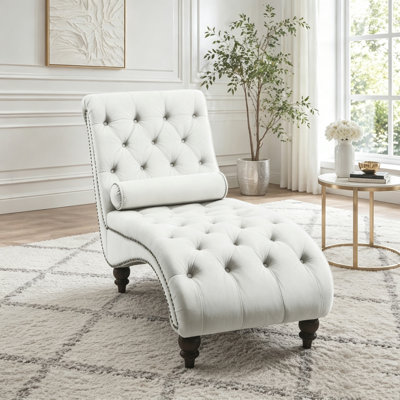 Fauteuil inclinable en velours capitonné