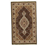 Hand Knotted Area Rug in Black And Cream