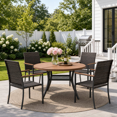 Holmstrom 4-Person Outdoor Round Patio Dining Set With Stackable PE Wicker Chairs