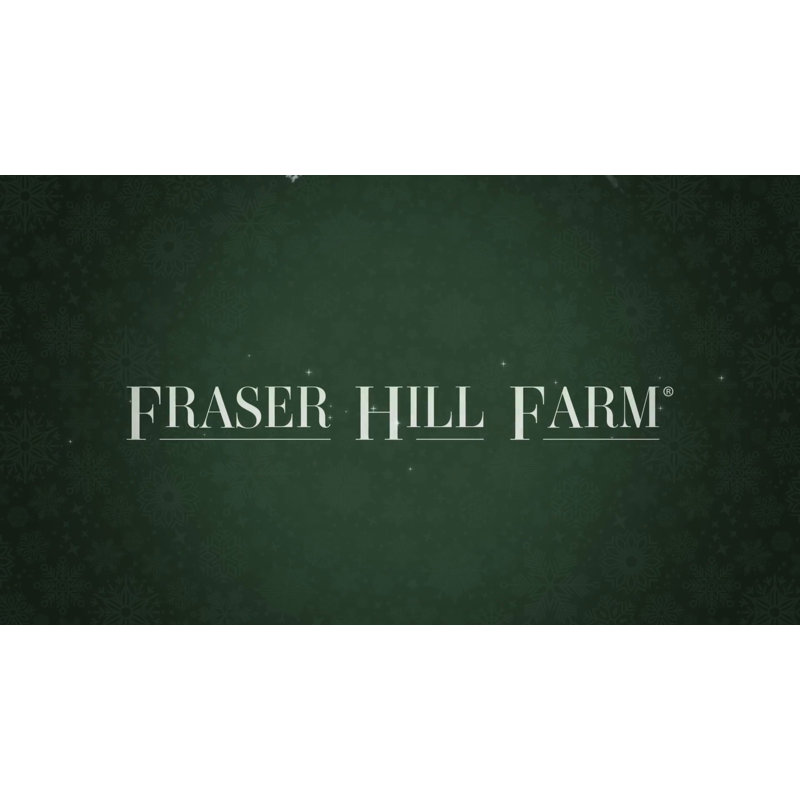 Fraser Hill Farm Indoor/Outdoor 4 ft. Candy-Look Nutcracker Greeter Oversized Christmas Décor