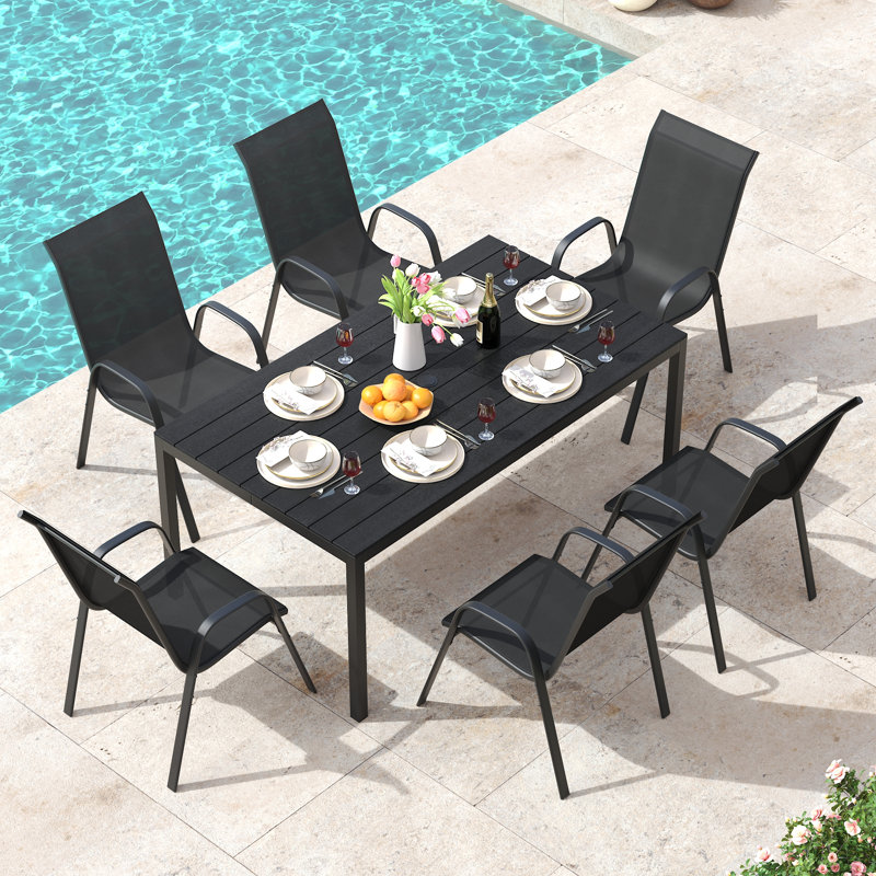 Ballynure Rectangular Patio Dining Set with Faux Wood Dining Table and 6 Stackable Textilene Chairs, Black/Black