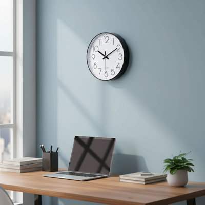 Grande horloge murale noire de 16 pouces: design moderne, élégant et minimaliste. Un ajout polyvalent et élégant à tout salon ou bureau. Horloge murale pratique et pratique.