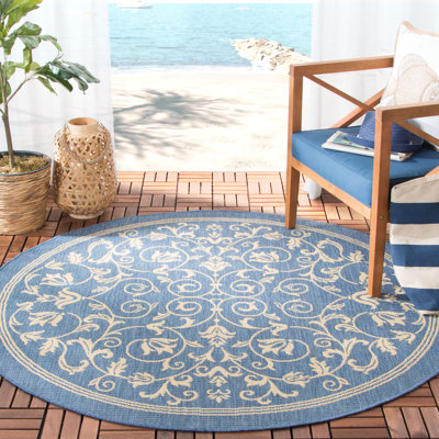 Tapis d'intérieur / extérieur à motif floral Cokley