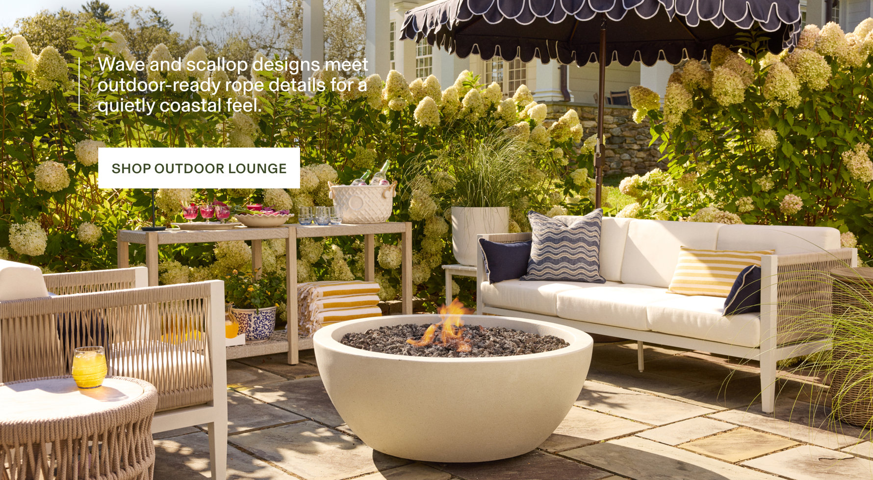 Wave and scallop designs meet outdoor-ready rope details for a quietly coastal feel. Shop Outdoor Lounge.