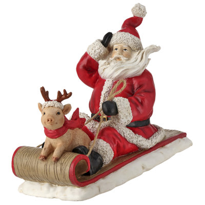 8" Resin Santa With Pig On Sled