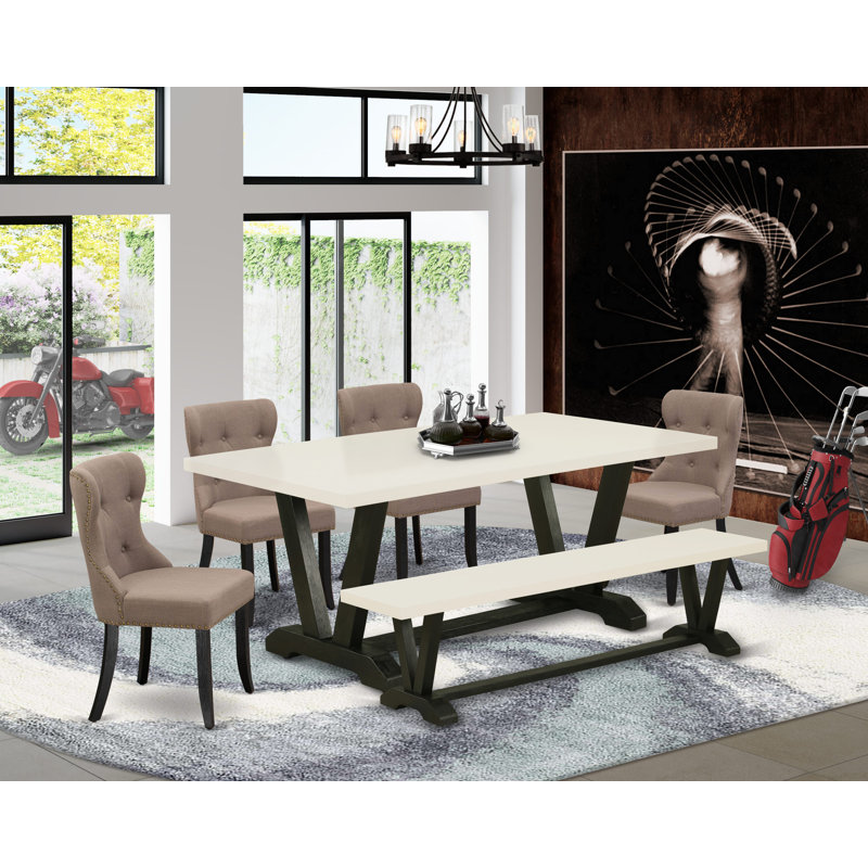 L'ensemble de table de cuisine 6 pièces contient une table de salle à manger rectangulaire avec pieds en V et 4 chaises Parson en tissu de lin avec banc, noir brossé