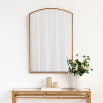 Elegant arched metal wall mirror