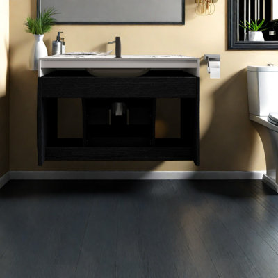 Meuble-lavabo compact et moderne avec rangement et lavabo en céramique pour les petites salles de bain