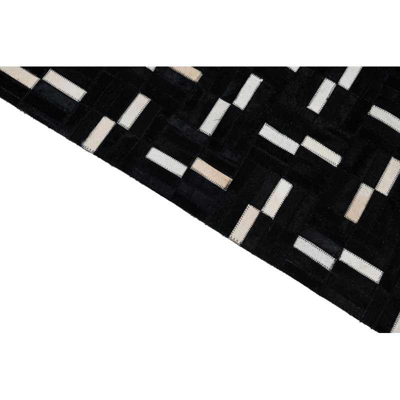 Tapis noir Isidore