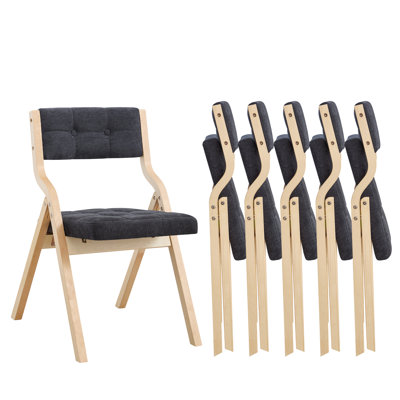 Chaise pliante au design élégant avec structure en bois massif et dossier et siège rembourrés capitonnés