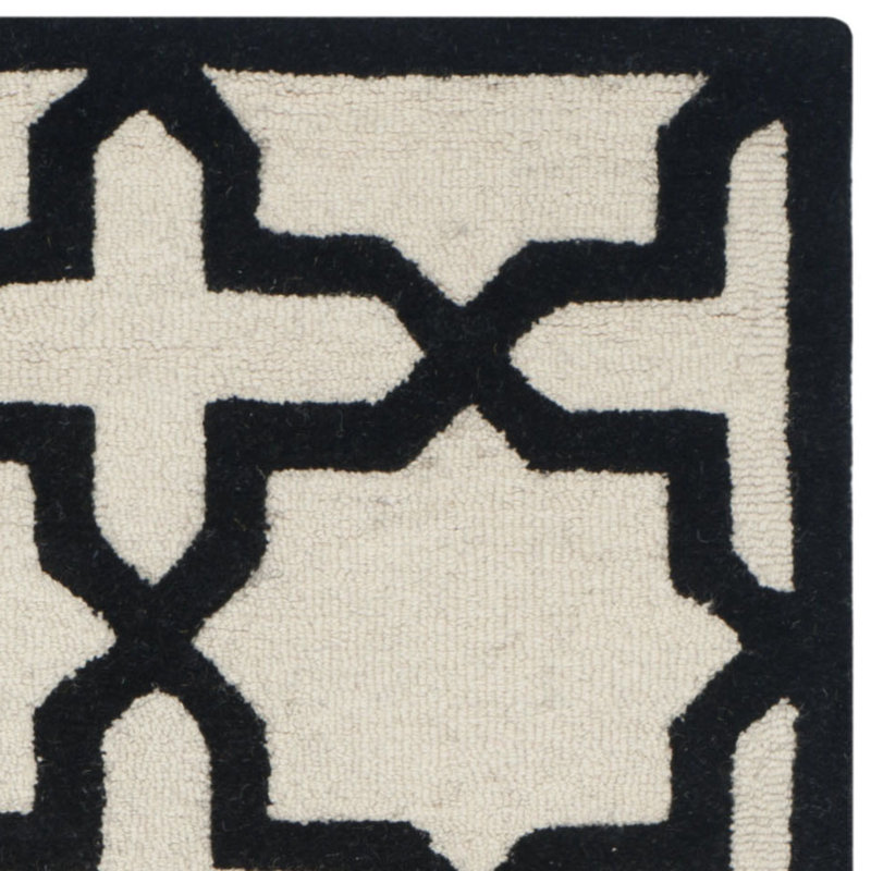 Hand-Tufted Black and Ivory Wool Area Rug, 2'6" x 4'