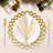 Gold Napkin Rings Set of 4 Stylized Overlapping Leaf Design for Elegant Dining Table Decor