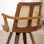 Chaise moderne rembourrée en similicuir à dossier en rotin-745583682