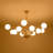 12 - Light Brass Frosted Glass Globe Starburst Chandelier