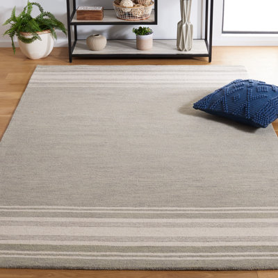 Cecilia Handmade Tufted Wool Ivory Area Rug