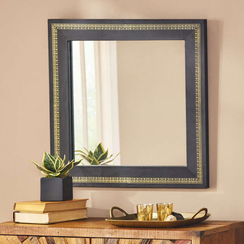 Miroir mural clouté en cuir