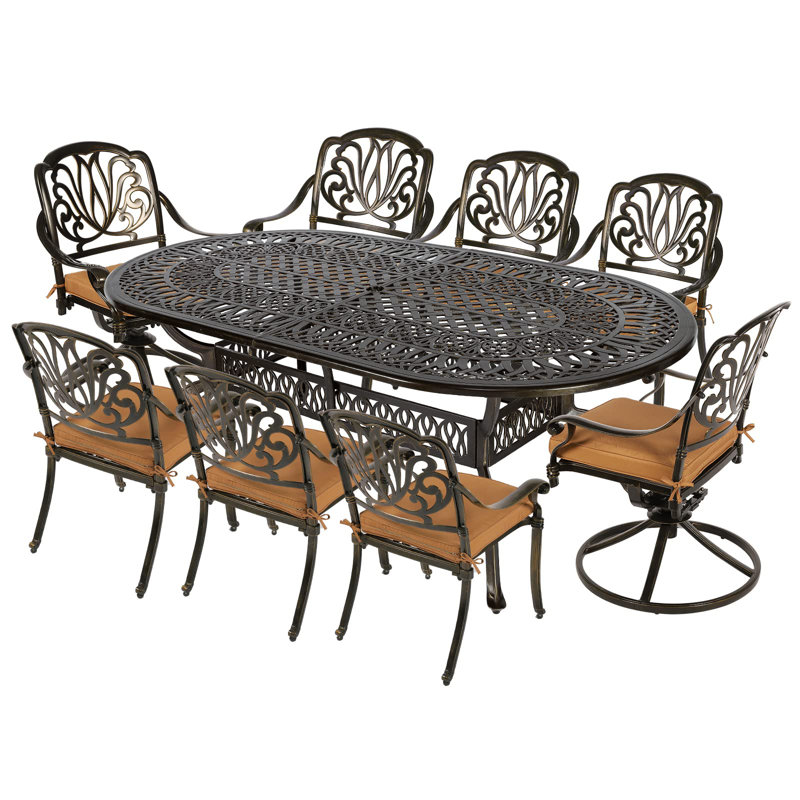 Risingsun 8 - Person Patio Dining Set with Oval Table , Cushions Included