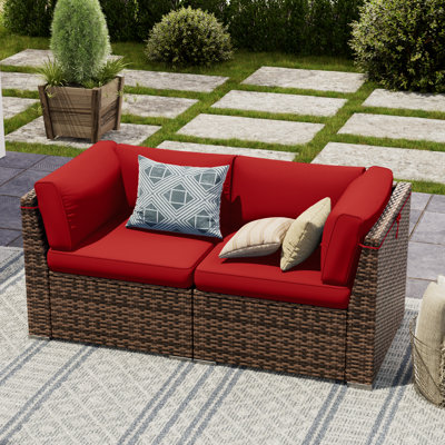 2 Piece Rattan Sectional Seating Group With Cushions