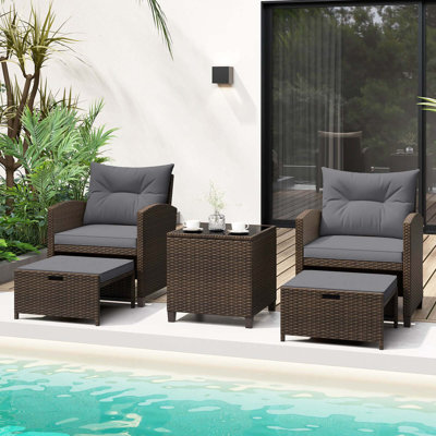 5 Pcs Patio Rattan Furniture With 2 Wicker Ottomans & Tempered Glass Coffee Table by Red Barrel Studio