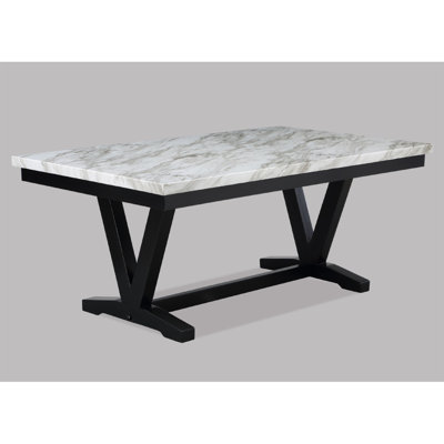 Table de salle à manger moderne en faux marbre avec table en forme de V et tréteaux