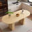 Oval Dining Table With Wood Strip Base-391441974