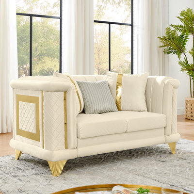 Canapé de 69 po en velours avec motif touffeté à rayures, coussins en mousse à mémoire de forme, structure à bordure dorée et texture brodée pour un salon luxueux.