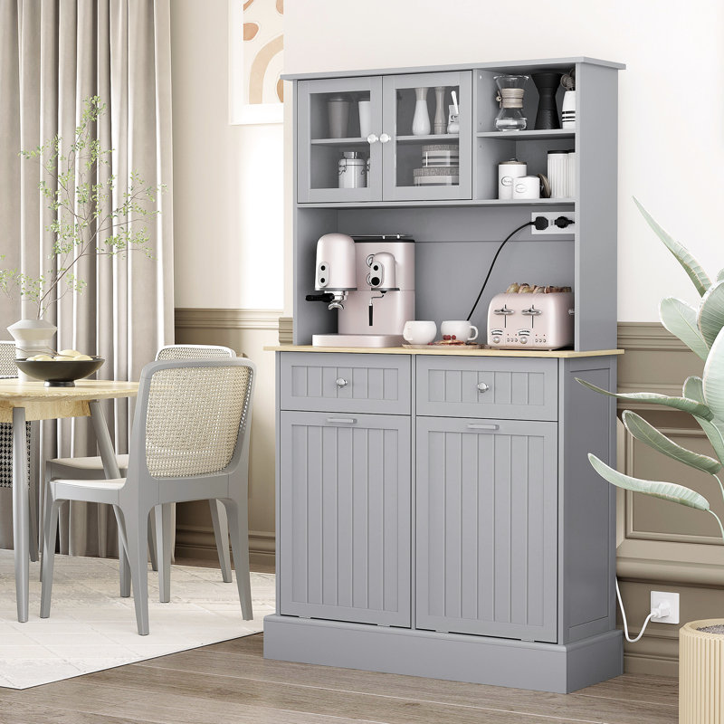 68" Gray Kitchen Pantry Storage Cabinet With Electrical Charging. Freestanding Glass Doors & Adjustable Shelf. For Various Spaces. 2 Tilt Out Trash Cabinets. Built-in Ac Outlets And Ports. Spacious