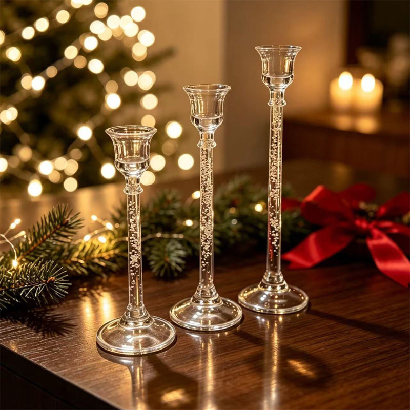 Décoration de Noël : Ensemble de trois bougies élégantes en résine et cristal avec effet intérieur, pour ajouter une touche de sophistication à tout décor.
