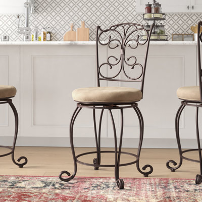 Alcrossagh Metal Swivel Bar & Counter Stool With Upholstered Seat by Fleur De Lis Living
