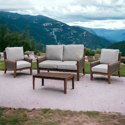 Ensemble de conversation 4 pièces avec causeuse, table basse et 2 fauteuils club Courtyard