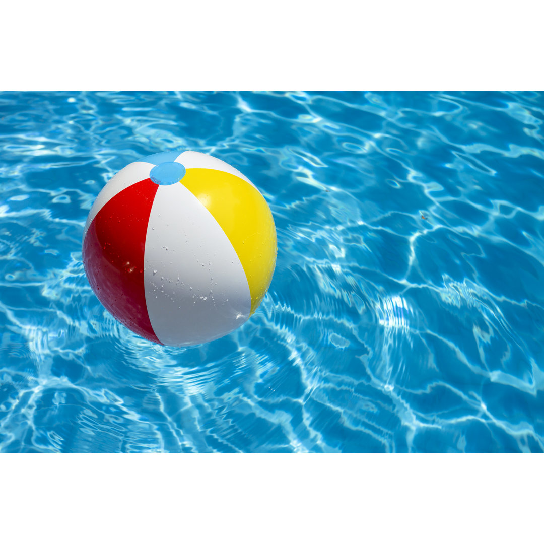 Strandball im Pool von Joakimbkk - Leinwandbild