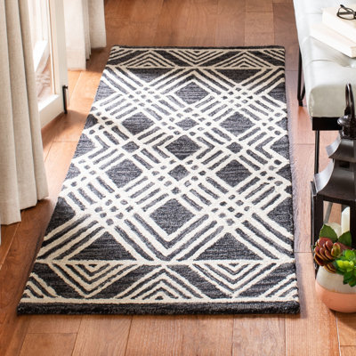 Vedika Hand Tufted Wool Southwestern Rug
