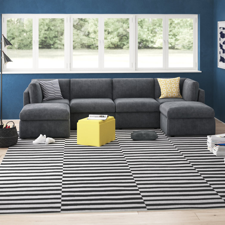 Annai 129" Wide Reversible Modular Corner Sectional with Ottoman